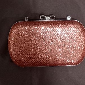Women's Sparkling Pink Clutch (minus the strap) by: Claire's